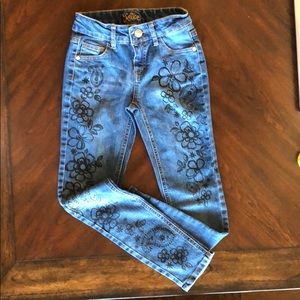 Girls super skinny decorated Justice brand jeans
